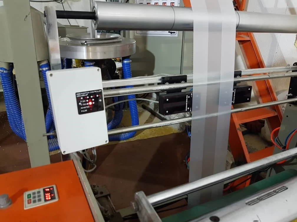 What is the film edge control system?